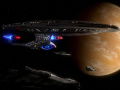 USS Enterprise-D im Orbit um Qualor II 2368.jpg