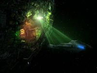 Voyager im Traktorstrahl einer Borg-Sphäre mit geöffnetem Hangar.jpg