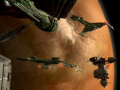 Klingonische Raumschiffe und Stationen im Orbit von Ty'Gokor.jpg
