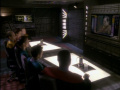 Besatzung von Deep Space 9 hört Tains Rede.jpg