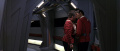 Kirk und Spock schmieden einen Plan im Korridor.jpg